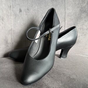Woman’s black character shoes